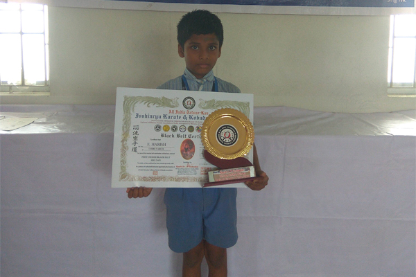 Our school student E.Harish III - STD received First Degree Black Belt in Karate competition.